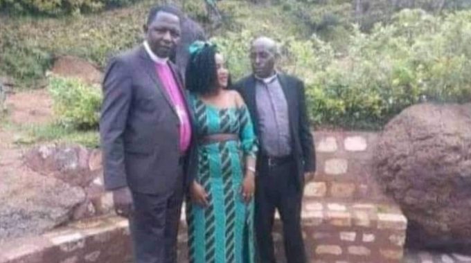 Rt. Archbishop Stanley Ntagali with Rev. Christopher Tugumenawe and by then wife Tukamuhabwa Judith