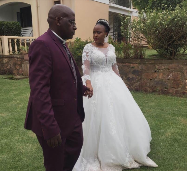 Rev. Christopher Tugumenawe wedded Tukamuhabwa at St. Peter's cathedral - Rugarama, Kabale in December 2018.