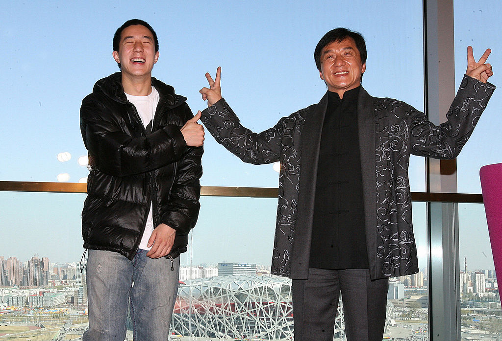 Hong Kong entertainer Jackie Chan (R) poses with his son Jaycee Fong Jo Ming