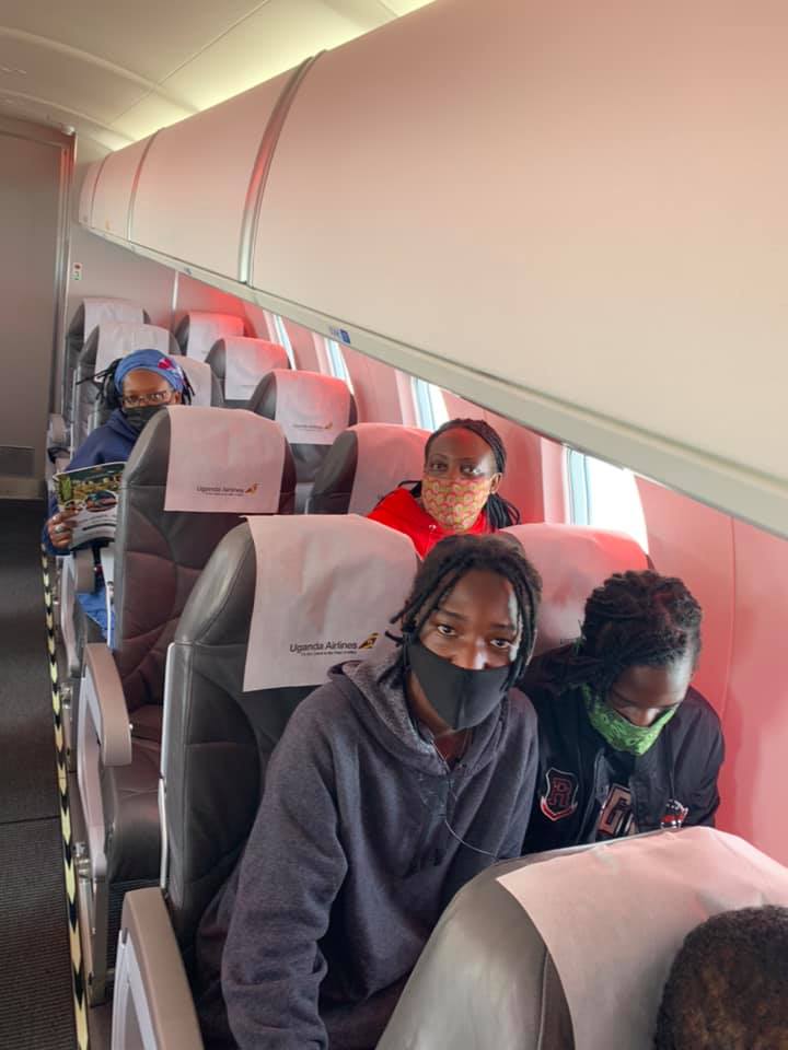 Stella Nyanzi and family aboard Uganda Airlines