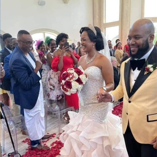 Princess Ruth Komuntale walks down the aisle with Anthony Philip