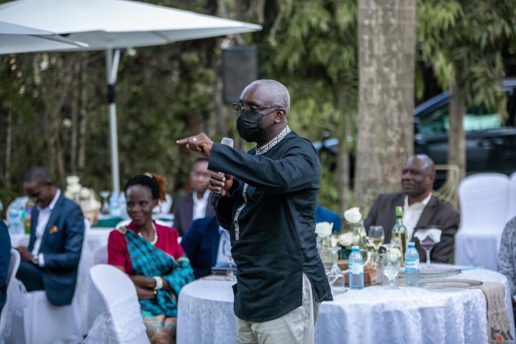Kabushenga giving speech at Rita Kanya introduces Raymond Mujuni