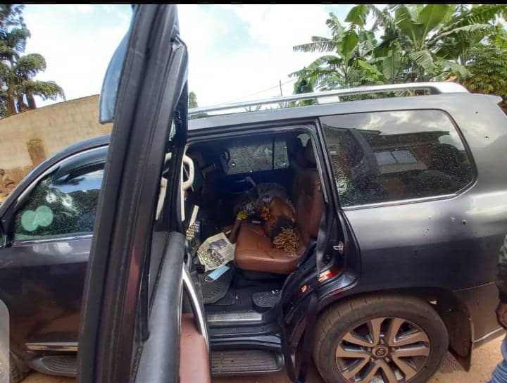 Brenda's lifeless body lying in Gen. Katumba's car