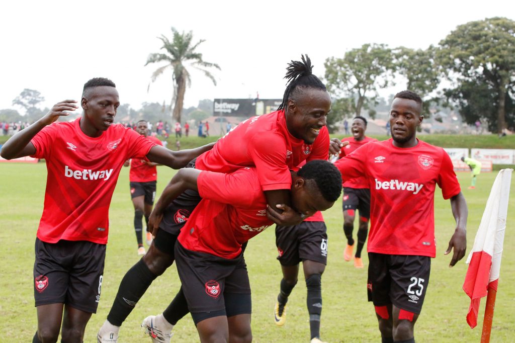 Lwesibawa celebrating with Eric Kambale