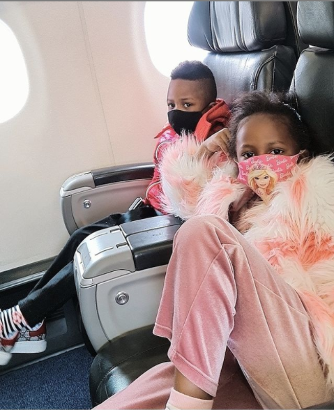 Tiffah and Nillan on plane to Tanzania yesterday 