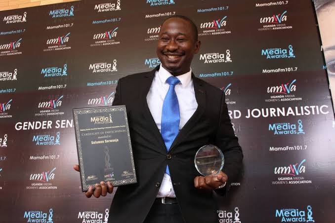 Solomon Serwanjja with awards