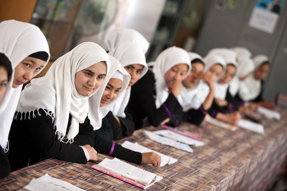 Afghan schoolgirls attending class