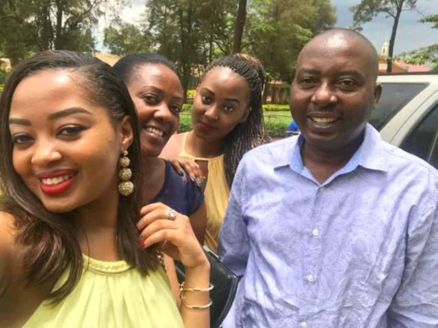 Anita Fabiola (L), her dad, Mugisha (R) with her mum and sister