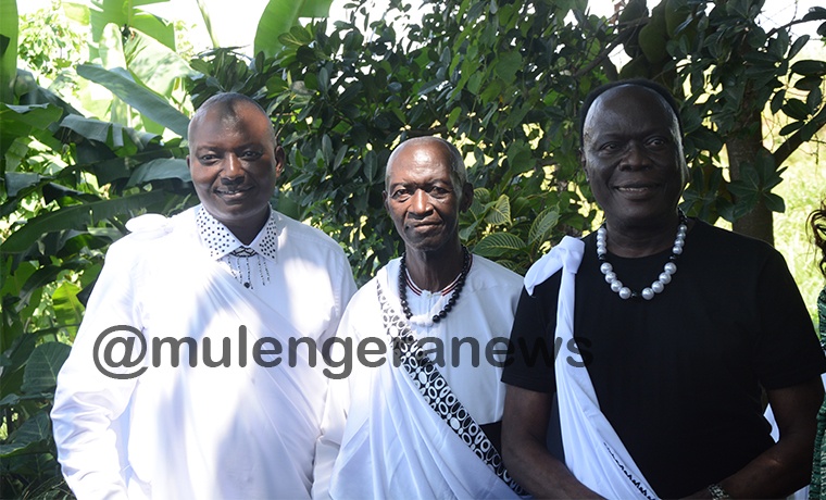 Bugingo (L) with fellow pastors; Edward Kayizi (M) and Simeon Kayiwa (L) at the introduction ceremony