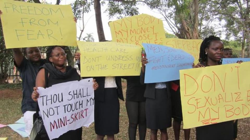 Stella Nyanzi (L) protesting against Lokodo's policies