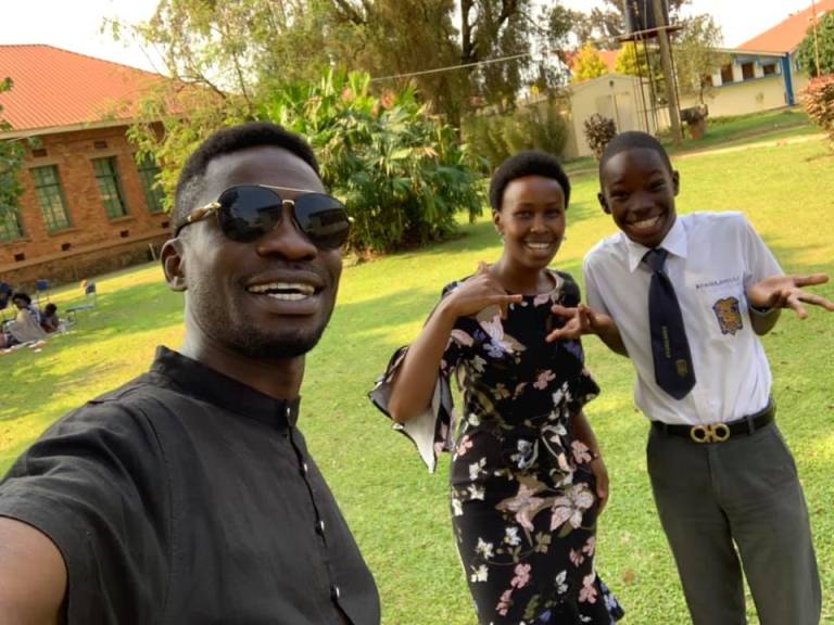 Bobi Wine and Barbie paying a visit to Solomon at school