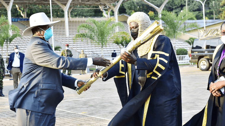 President Museveni handing over power of instruments to Jacob Oulanyah at Kololo