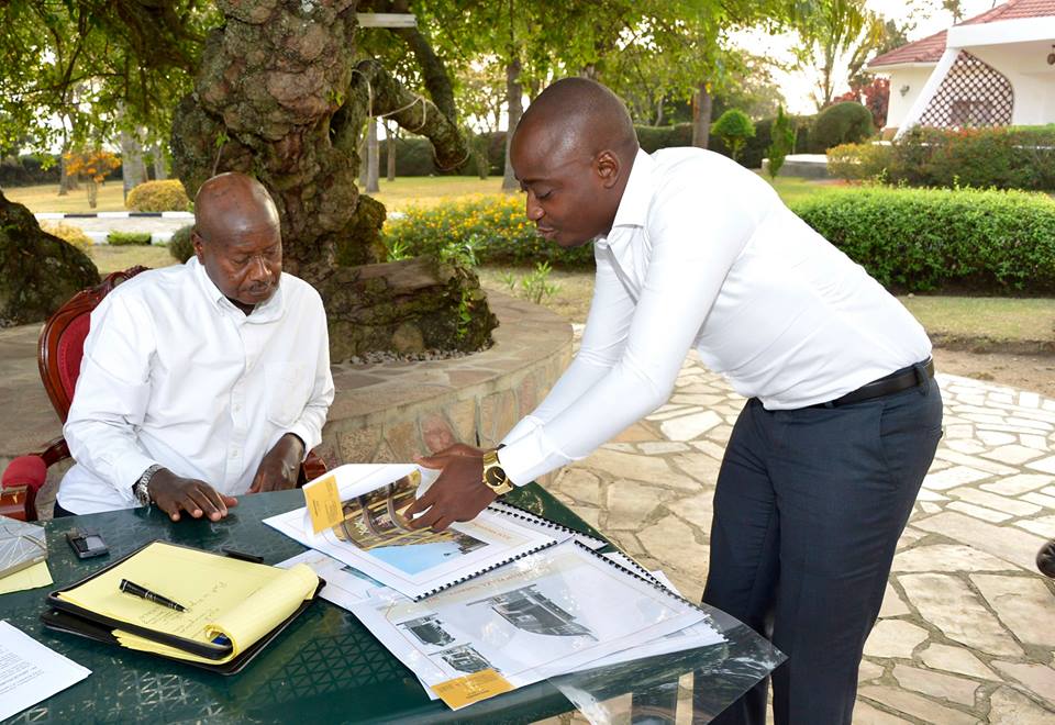 Hamis Kiggundu showing president Museveni some of his projects