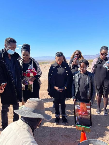 Zella with children and friends at the burial