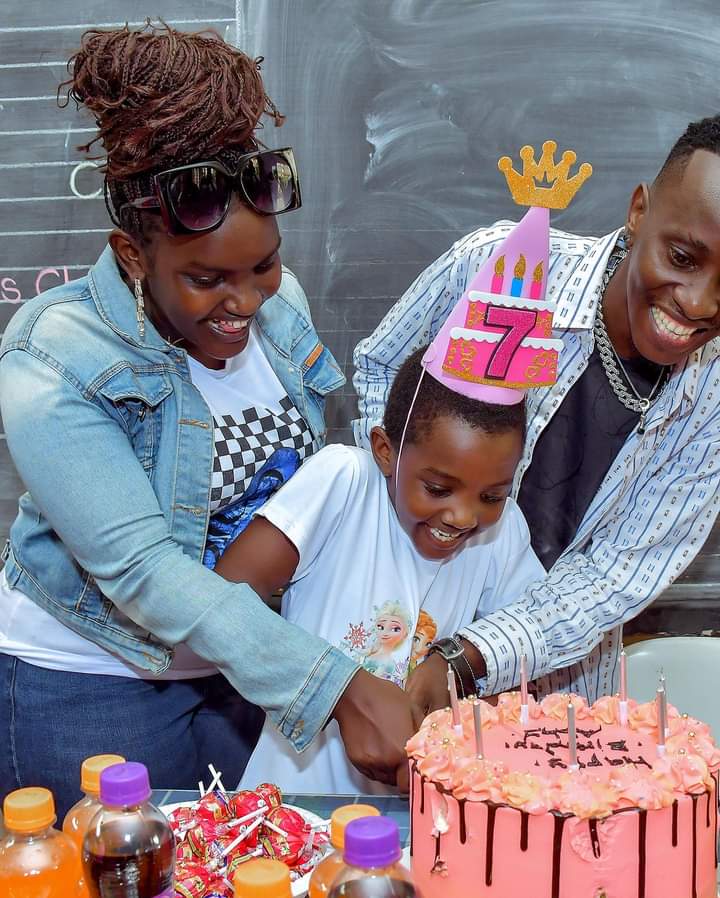 Fille and MC kats cutting cake with their daughter, Abby Kisakye