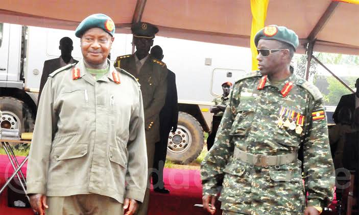 President Museveni (L) with Gen. Tumwiine (R)