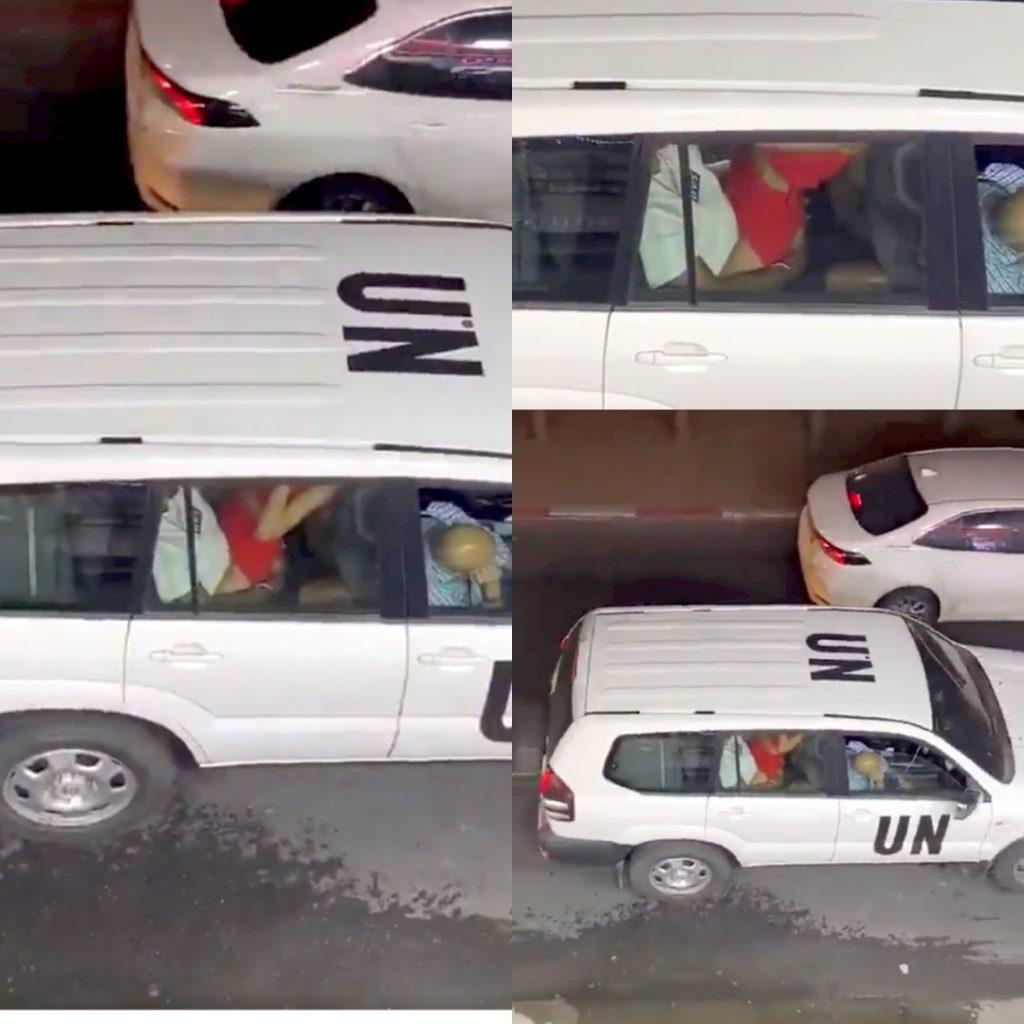 UN official shaking in car