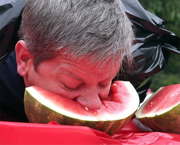 Man enjoying watermelon