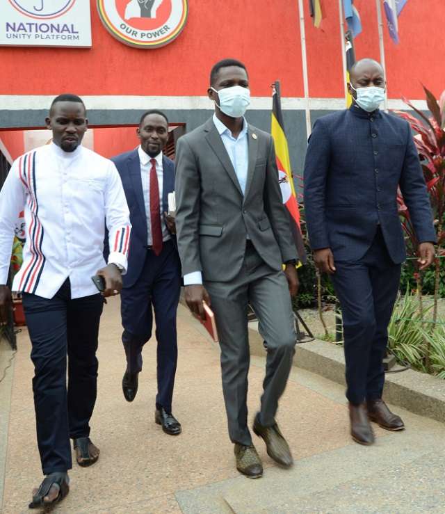 Bobi Wine (centre) with NUP spokesperson Joel Ssenyonyi (left) and NUP secretary general Lewis Rubongoya