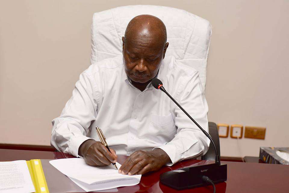 President Museveni signing the Anti Homosexuality bill