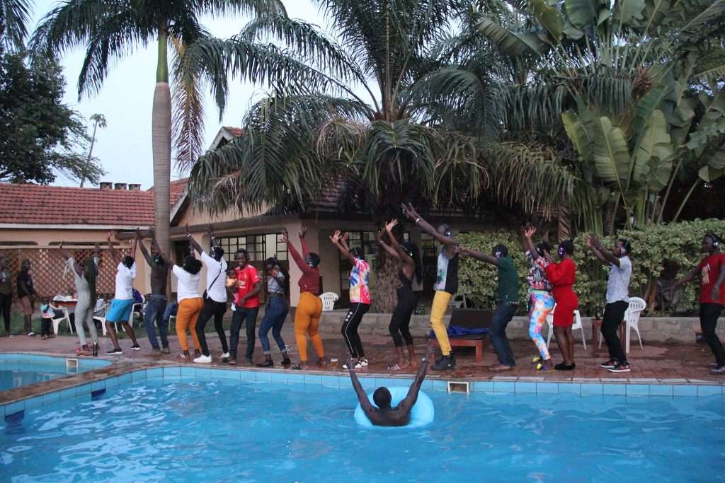 Revelers parting on the swimming pool side