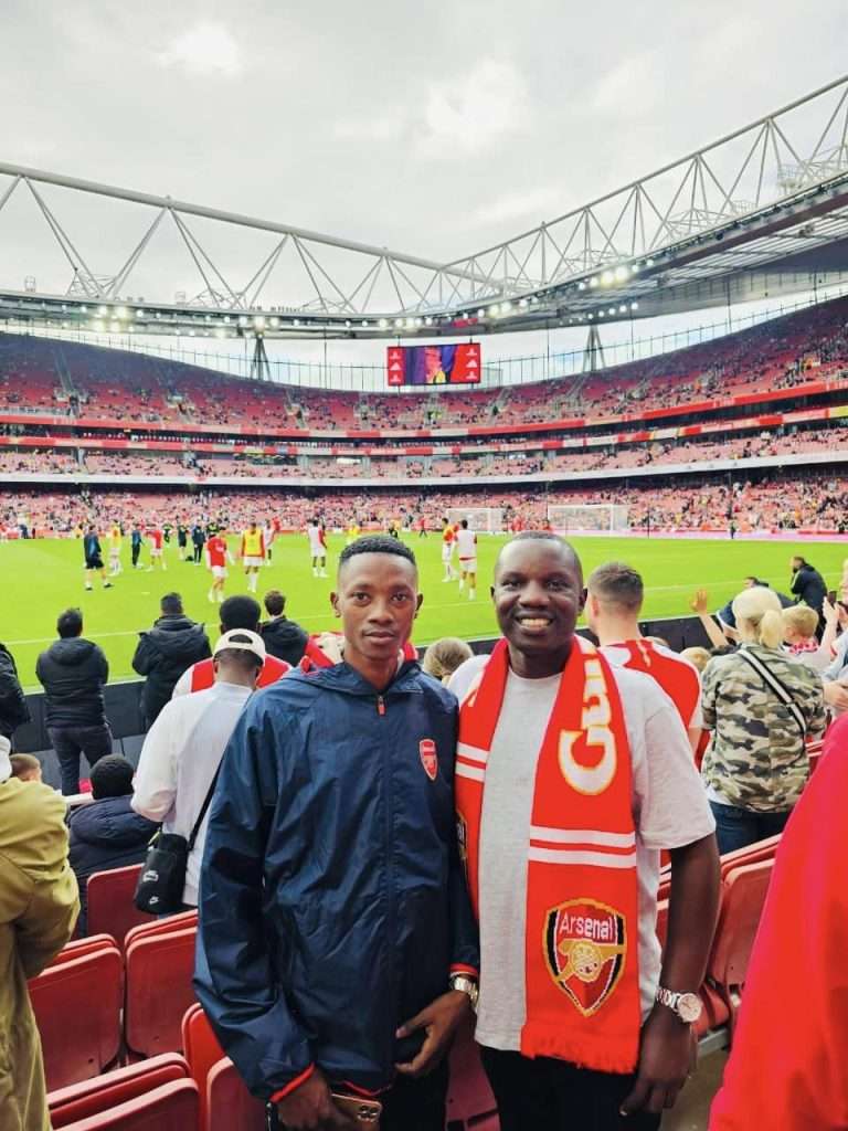Kakalaamu with Kaye Wisdom watching Arsenal FC at Emirates Stadium